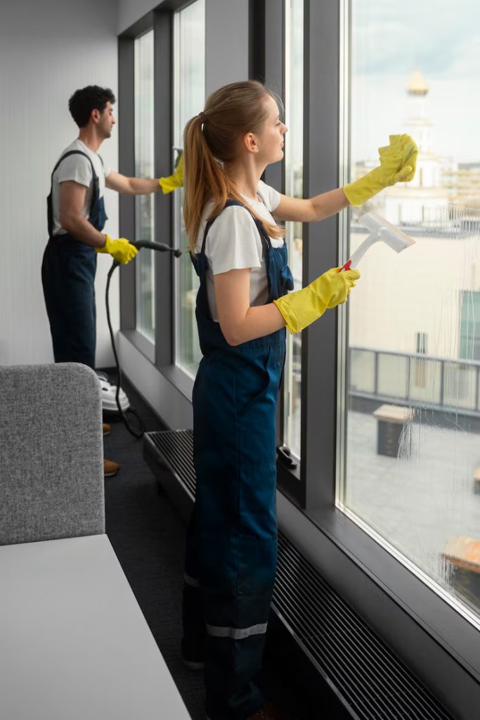 full-shot-people-cleaning-office_23-2150454557